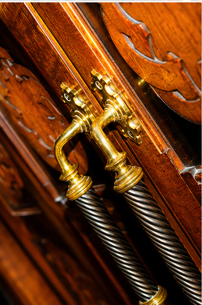 Carved wooden doors of the Ark with polished brass fittings, Lauderdale Road Synagogue.