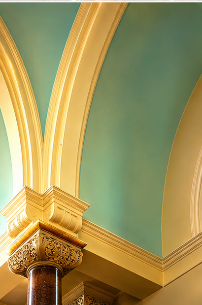The painted vaulting and arches of the synagogue ceiling.