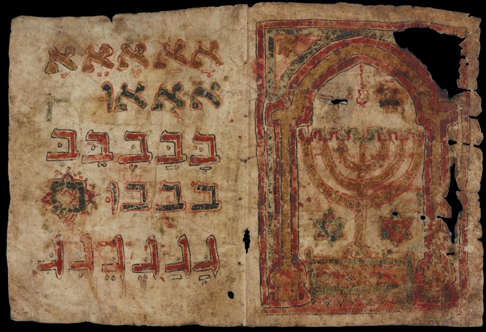A child&rsquo;s alphabet practice page from the storeroom of the Ben Ezra Synagogue in Fustat — roughly nine centuries old. Hebrew letters in red ochre on parchment with an illuminated menorah panel.